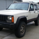 1996 Jeep XJ: the poor victim of a cracked cylinder head, and currently suffering from a broken engine mount bolt.